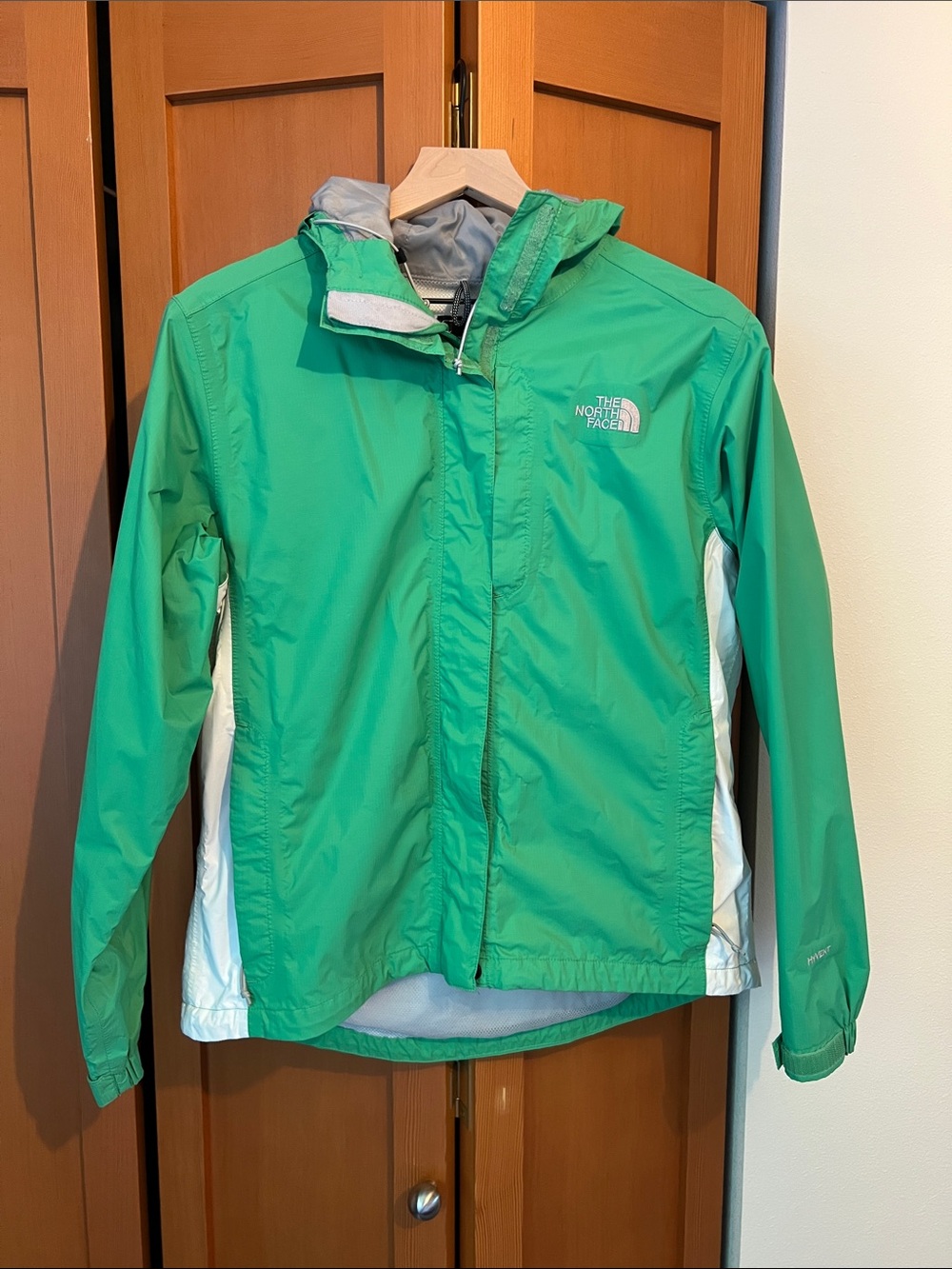 The North Face Green and White Hooded Rain Jacket